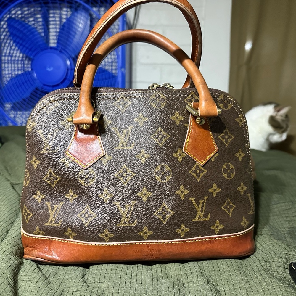 Louis Vuitton Alma Monogram Purse